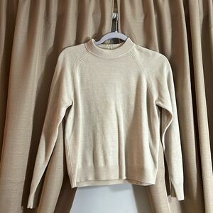Cream reversible quarter zip sweater